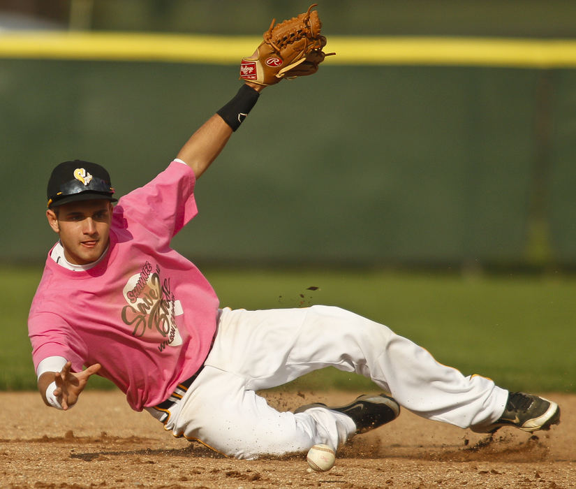 Sports - HMZac Crislip from Shawnee High School dives for a ground ball during a baseball game against Graham. Shawnee won the game 9-7.  (Barbara J. Perenic / Springfield News-Sun)