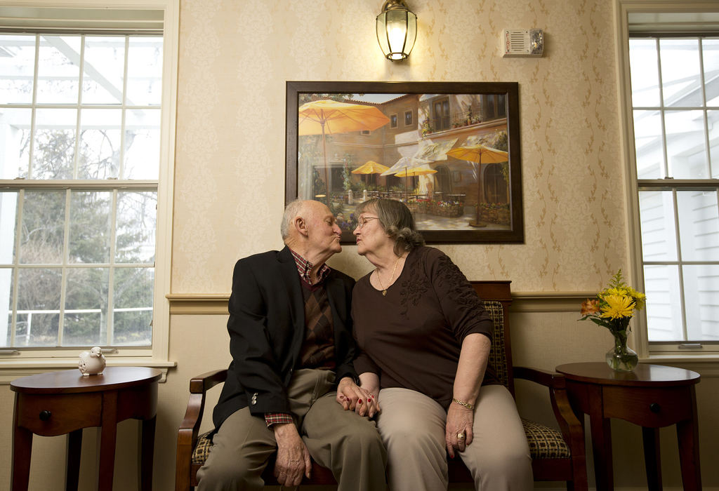 Portrait - 3rd placeBob Hart, 88, and Lona Sager, 79, pose for a photograph near the piano where they first met at their retirement community Sunrise Living Center in Gahanna. The pair met recently when Bob was drawn to Lona's piano playing and since then they have been inseparable around the community. Although mostly platonic since both have memory issues, their relationship revolves around eating together, singing together and laughing all day. (Eamon Queeney / The Columbus Dispatch)