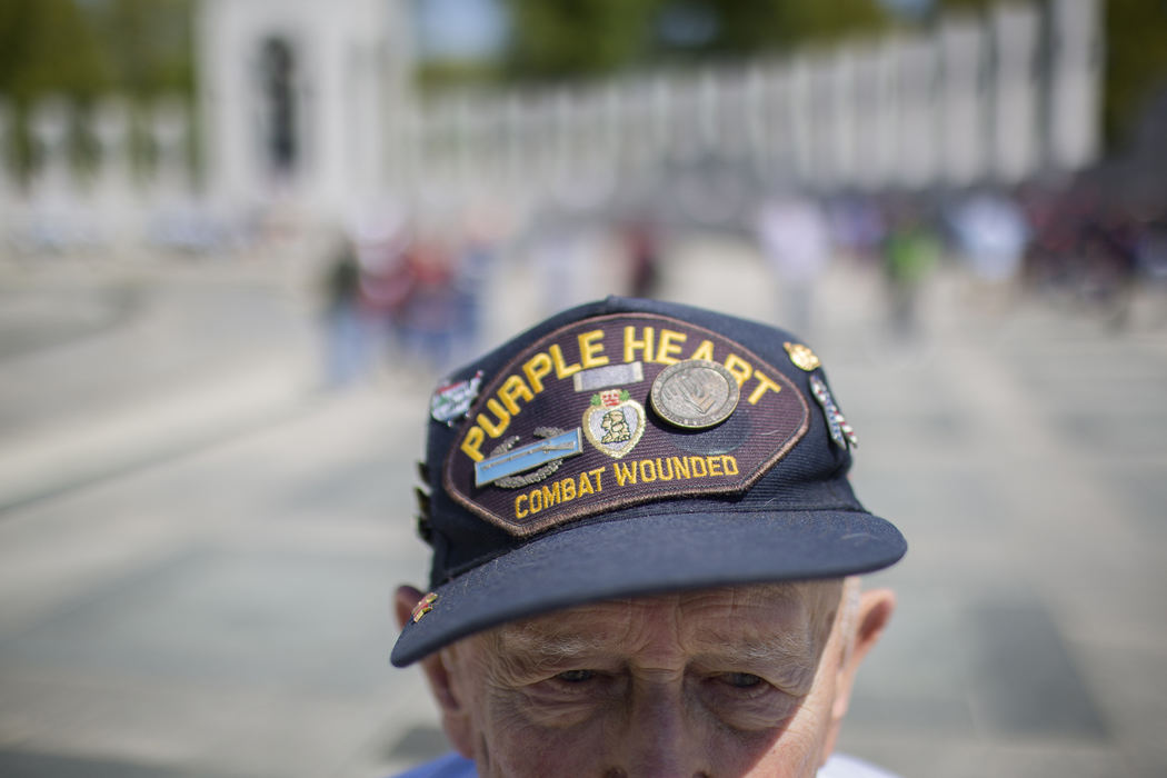 Story - 2nd placeWorld War II Army veteran Chuck Gaiser, of Radcliffe, Ohio, stands at the World War II Memorial in Washington, D.C. Gaiser came with more than 70 veterans and their guardians to see the memorial with Honor Flight Columbus. (Joshua A. Bickel / ThisWeek Newspapers)