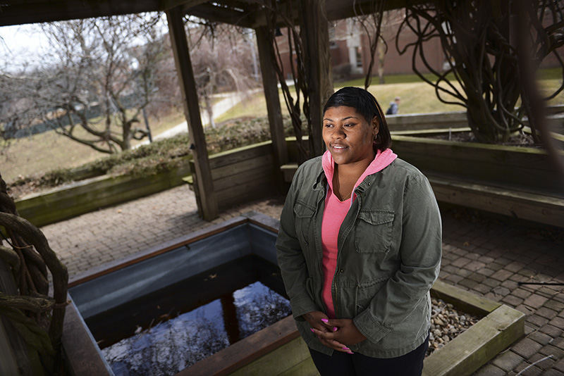 Portrait - 3rd place - Communication studies junior Brianna Bradley poses for a portrait at the Kent State-Stark campus. Bradley has keratoconus, a vision impairment caused by a thinning in one or both eyes' cornea. Bradley had a successful corneal transplant in her left eye. but is now experiencing peripheral vision loss in her right eye.  (Jenna Watson / Kent State University)