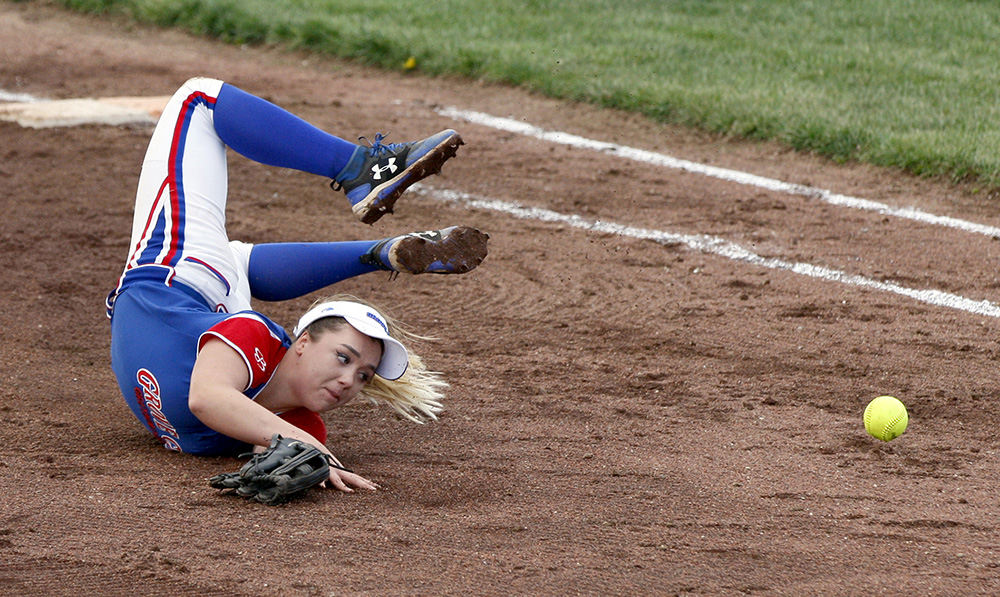 SPSports - 2nd place - Grove City's Sierra Reid twists on the ground after attempting to make a diving catch during a game against Hilliard Davidson at Grove City High School. Hilliard Davidson defeated Grove City, 2-0. (Shane Flanigan / ThisWeek Community News)