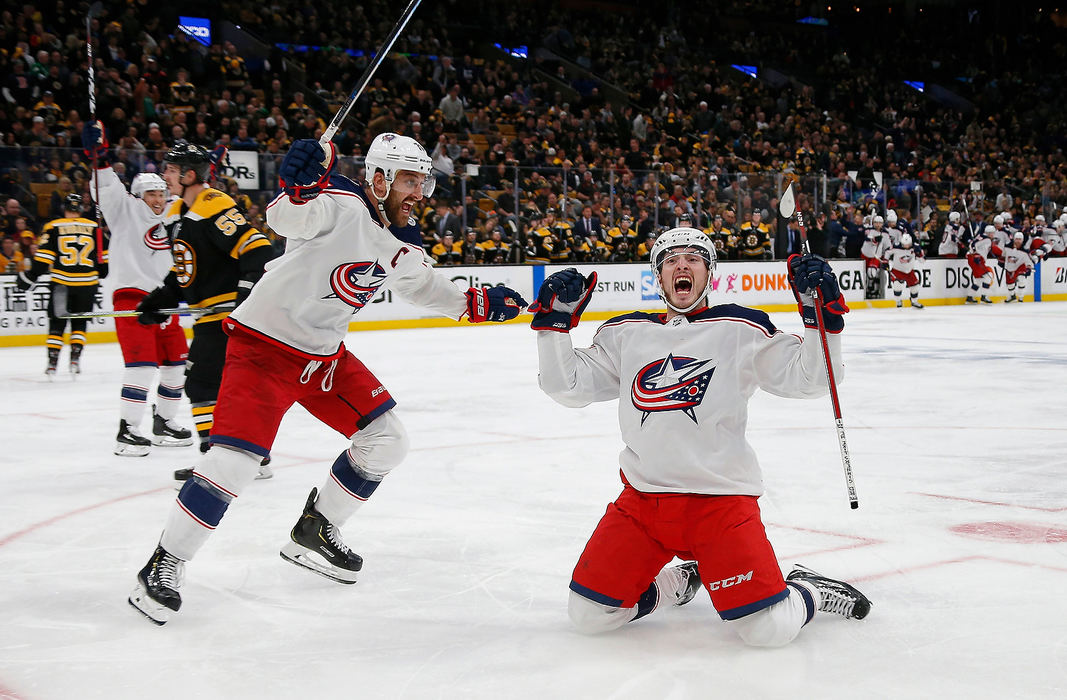 Sports Feature - HMColumbus Blue Jackets center Matt Duchene (95) celebrates scoring the game-winner with left wing Nick Foligno (71) during the second overtime of Game 2 of the NHL Eastern Conference semifinals against the Boston Bruins at TD Garden in Boston. (Adam Cairns/The Columbus Dispatch)