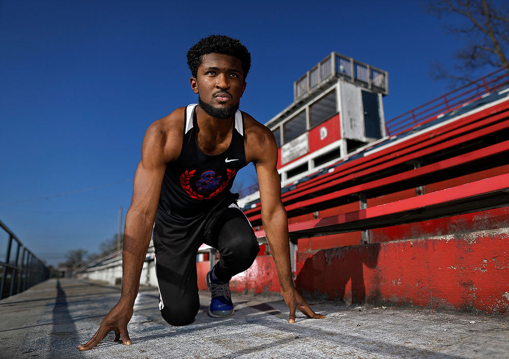 Portrait - HM - Eastmoor Academy track star Ira Graham IV poses for a photo at Eastmoor Academy High School Stadium in Columbus.  Graham lost his spring track season due to the coronavirus. Kyle Robertson / The Columbus Dispatch