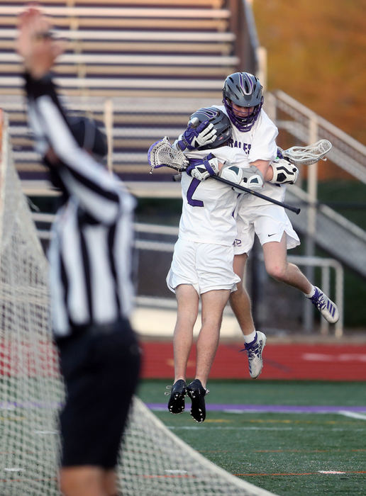 Sports Feature - HM - DeSales' David Chintala and Blake Carawan (2) celebrate Chintala's goal against Watterson during a game at St. Francis DeSales High School in Columbus. (Shane Flanigan / ThisWeek Community News)