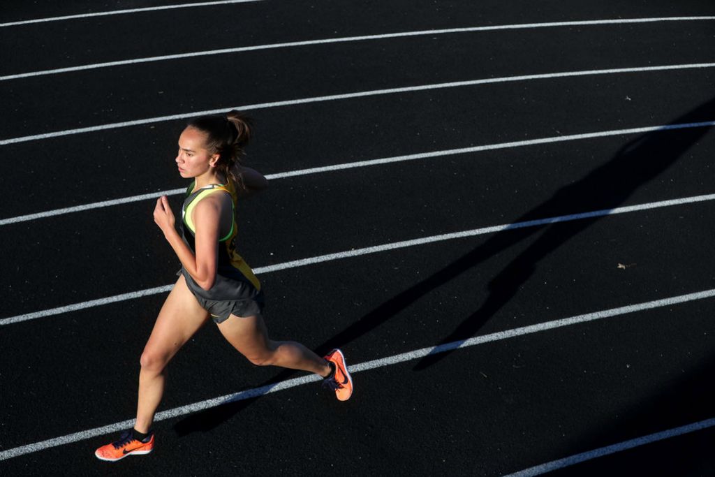 Sports - 3rd place - Upper Arlington's Khera North competes in the 1600-meter run during a tri-meet at Upper Arlington High School. (Shane Flanigan / ThisWeek Community News)