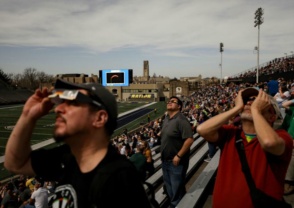 Feature - 2nd place - People watch the total solar eclipse at the University of Toledo’s Glass Bowl on Monday, April 8, 2024.  (Kurt Steiss / The Blade)