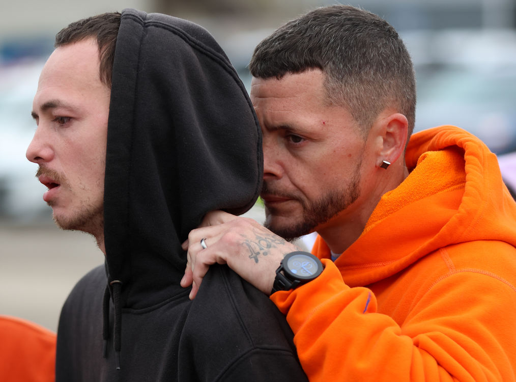 General News - 2nd place - Michael Hatfield (right) consoles his brother Nicholas Phillips as Phillips speak to the media ahead of a vigil being held outside Swan Boat Club in Newport, Michigan. They are both uncles of Zayn and Alanah Phillips. People gathered to pay their respects where two young siblings, Zayn, 4, and Alanah, 8, were killed after an alleged drunk driver crashed into the building during a birthday party on April 20.  (Kurt Steiss / The Blade)