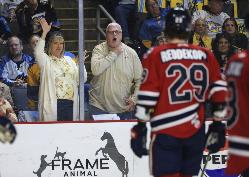 Sports Feature - 3rd place - Toledo fans heckle Kalamazoo’s Chaz Reddekopp during the first period of an ECHL playoff hockey game at the Huntington Center in Toledo. (Rebecca Benson / The Blade)