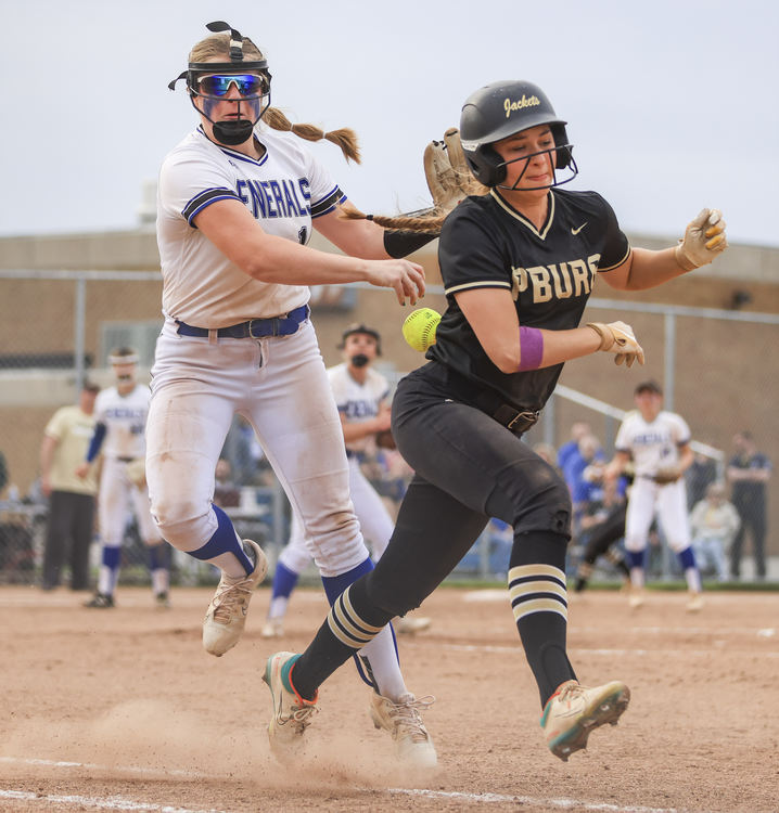 Sports - 2nd place - Anthony Wayne’s Kat Meyers loses the ball after tagging Perrysburg’s Morgan Hoverman on the baseline during a Northern Lakes League Buckeye Division softball game at Anthony Wayne High School. (Rebecca Benson / The Blade)