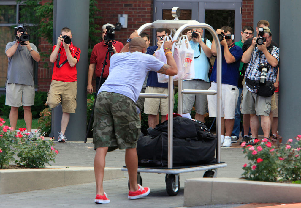 General News - HM -  Ohio State football player DeVier Posey arrives at Hyatt Place, the team hotel, where a wall of photographers converged,Sunday August 7, 2011.    ( Columbus Dispatch photo by Jeff Hinckley)   (Jeff Hinckley / THE COLUMBUS DISPATCH)