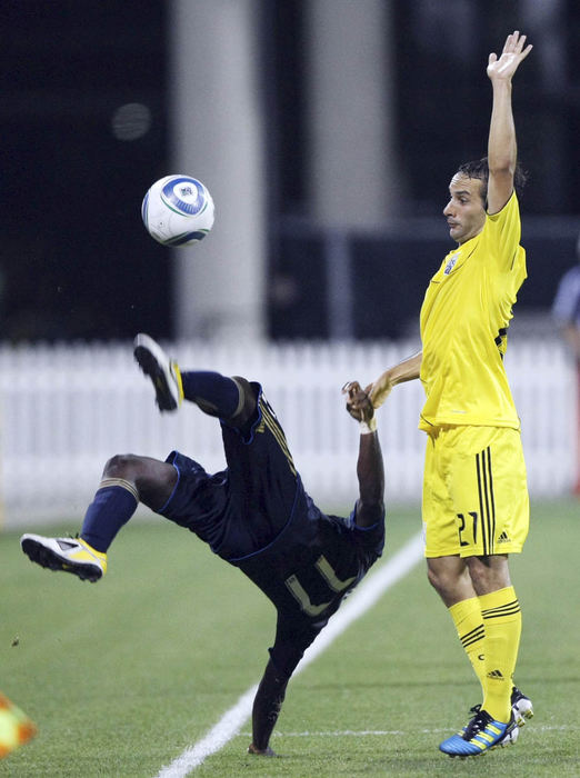 Sports - 2nd place - Crew's Sebastian Mirnada (21) and Union's Freddy Adu (11) (Neal C. Lauron / The Columbus Dispatch)