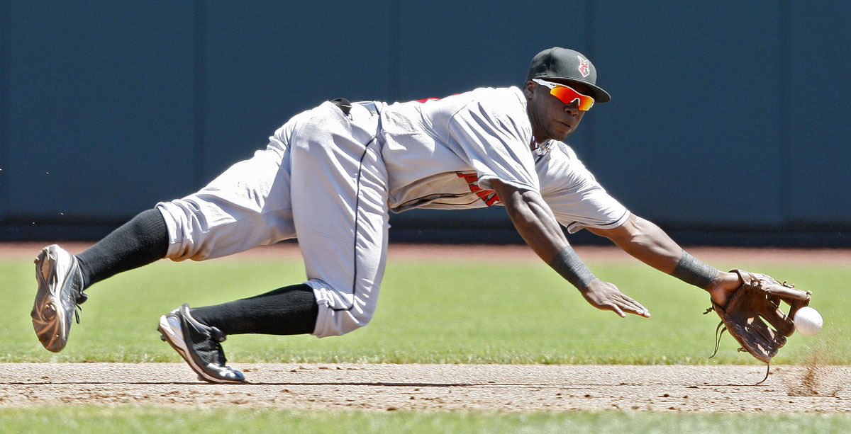 Sports - HM - Indianapolis Josh Harrison (19) just misses a the ball at third base against the Columbus Clippers during their minor league game at Huntington Park. (Kyle Robertson / The Columbus Dispatch)