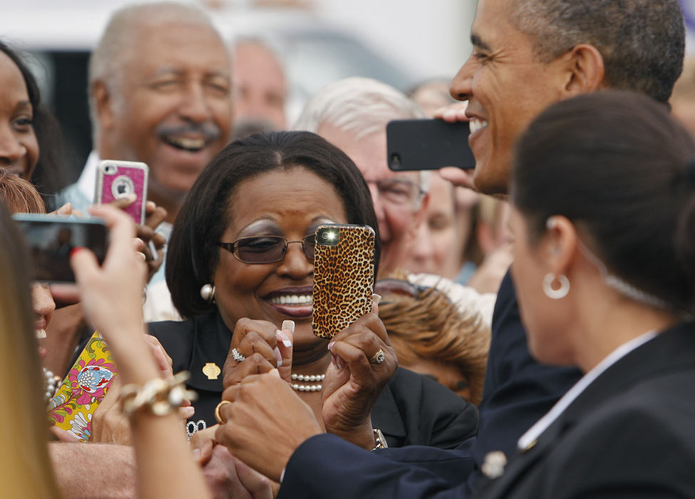 Story - 2nd placePresident Obama gets his picture taken by supporters after landing at Rickenbacker International Airport in Columbus,. (Kyle Robertson / The Columbus Dispatch)