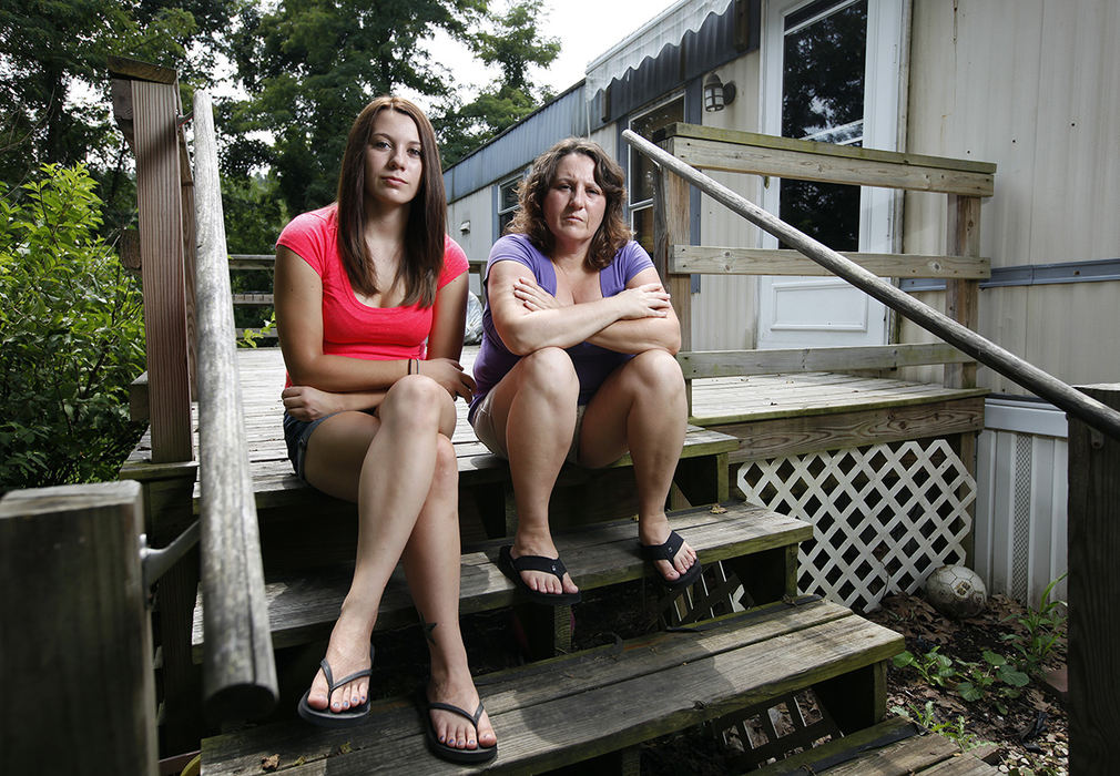 Portrait - 2nd placeKarla Kranyik, 39, and her daughter Bradlie Kranyik, 17, found out in late July that they have until Sept. 1 to move from the Hillview Mobile Village on the south side of Lancaster. The mobile home park is being closed by owner Mark Anthony for EPA violations. Bradlie is a junior at Berne Union, and her mother doesn't want to move her away from the school. (Adam Cairns / The Columbus Dispatch)