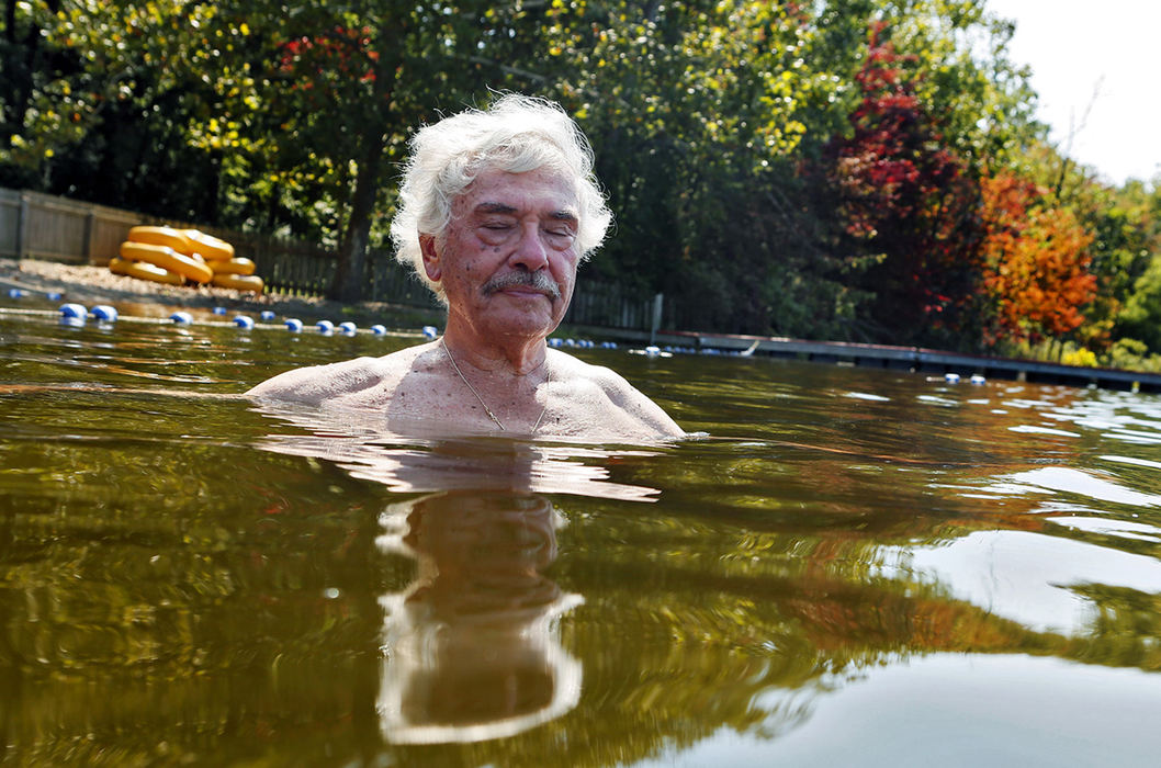 Story - 3rd placeDick Schwartz, 77, enjoys a plunge in the lake at The Mens Camp at the YMCA Camp Wilson in Bellefontaine which has been tradition since 1919. Schwartz has been a camper for 43 years.  (Eric Albrecht / The Columbus Dispatch)