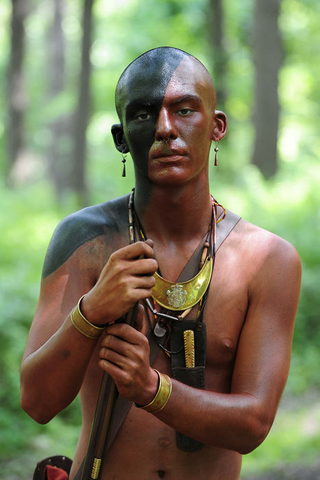 Portrait - 2nd place - Reenactor Vincent Baird, of Level Green, poses for a portrait after the re-enactment of the Bushy Run Battle in Harrison City, PA. The battle was fought between the forces of King George III and a confederation of Native Americans. (Daniel Kubus / Ohio University)