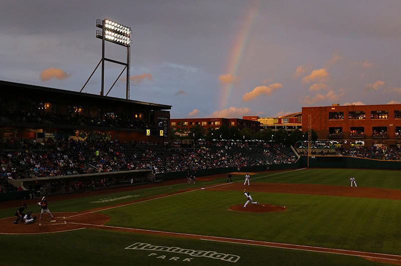 Sports Feature - HM - Columbus Clippers pitcher Danny Salazar delivers to the plate as a rainbow appears during the game between the Clippers and the Lehigh Valley IronPigs at Huntington Park. (Jonathan Quilter / The Columbus Dispatch)