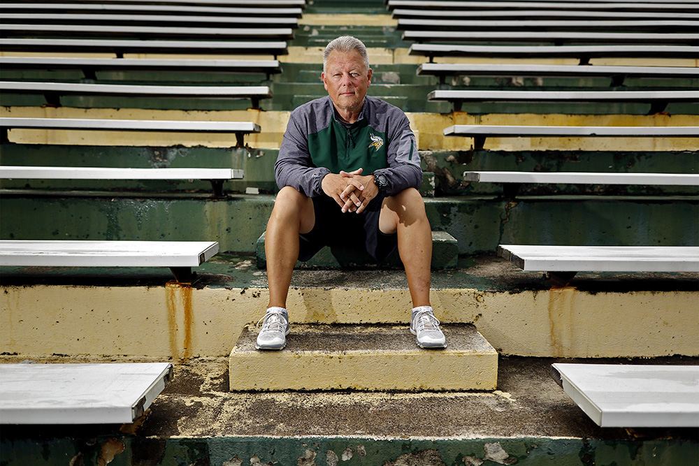 Portrait - 1st place - New Northland football coach Brian Staats poses for a photo before practice at Northland High School in Columbus. (Kyle Robertson / The Columbus Dispatch)