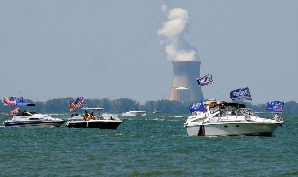 General News - 3rd place - Boaters sail in front of the Davis-Besse Nuclear Power Plant as they show their support for President Donald Trump during the Ottawa County Trump Flotilla in Lake Erie in Port Clinton. Kurt Steiss / The Blade