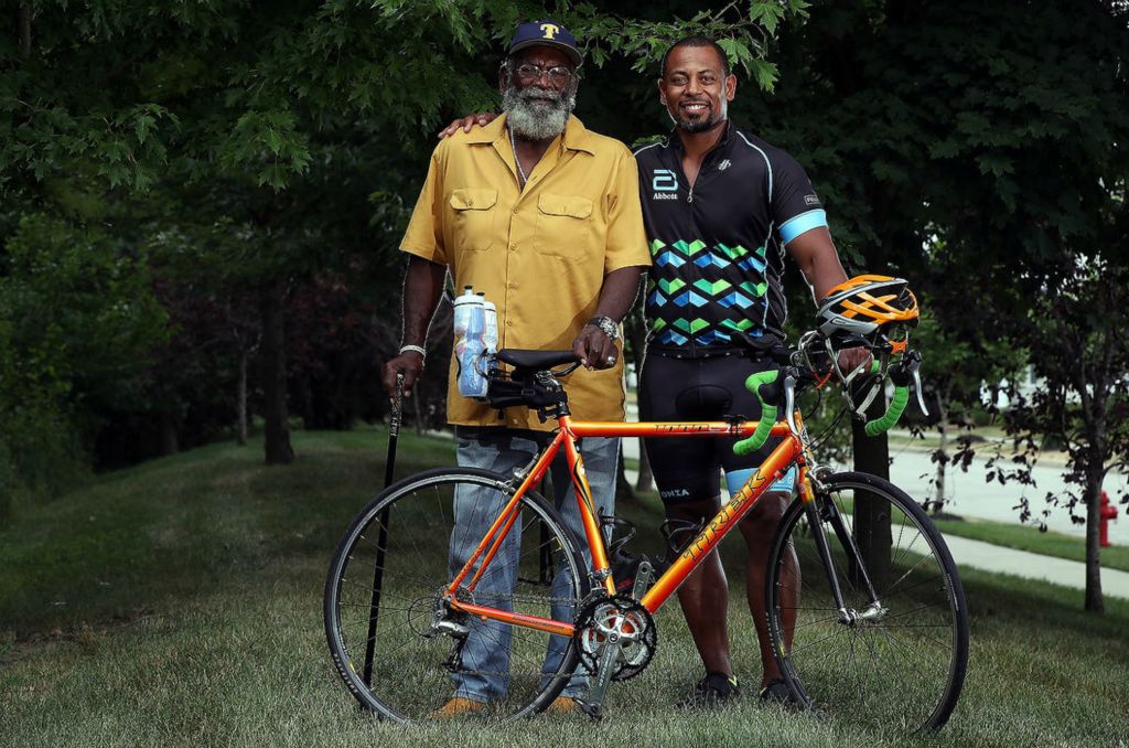 Portrait - 2nd place - New Albany resident Joshua Reams (right) is participating in his fourth Pelotonia in honor of his father, Vernon Reams, (left) who was diagnosed with Stage 4 large B-cell non-Hodgkin lymphoma in April 2009. Vernon has since been treated and declared cancer free.  Shane Flanigan / ThisWeek Community News