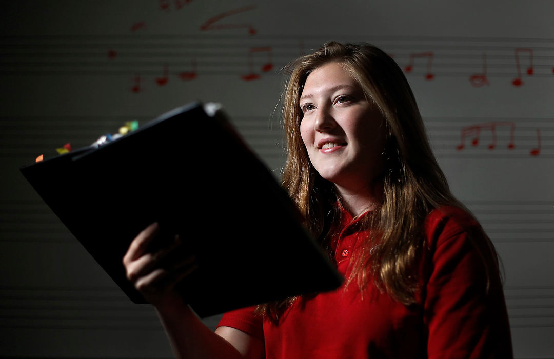 Portrait - 2nd placeKatie Roddy, an Olentangy Berlin High School junior who sings in the Columbus Children’s Choir, recently won a scholarship, which pays for her upcoming choir season. Her essay described how learning to read music helped her cope with her dyslexia which was causing her schoolwork to suffer.   (Kyle Robertson / The Columbus Dispatch)