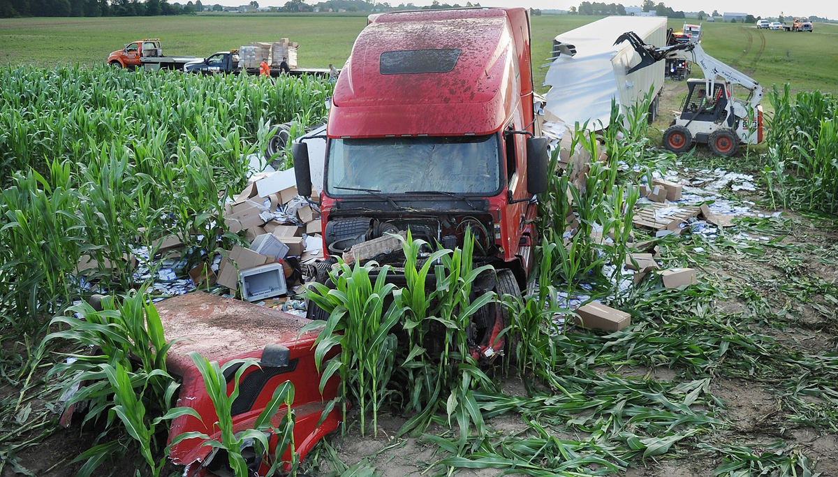 Spot News - 2nd placeA semi-trailer truck, transporting packing material for feminine products, crashed into a corn field along Ohio 29  in Celina.  (Daniel Melograna / The Daily Standard)