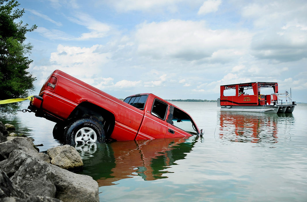 Spot News - HMTwo stolen cars were found by Celina Fire divers off Grand Lake’s west bank and Celina Police Chief Tom Wale is warning locals to take steps to prevent theft. The vehicles found had both been reported missing in Celina, Wale told the newspaper.  (Daniel Melograna / The Daily Standard)