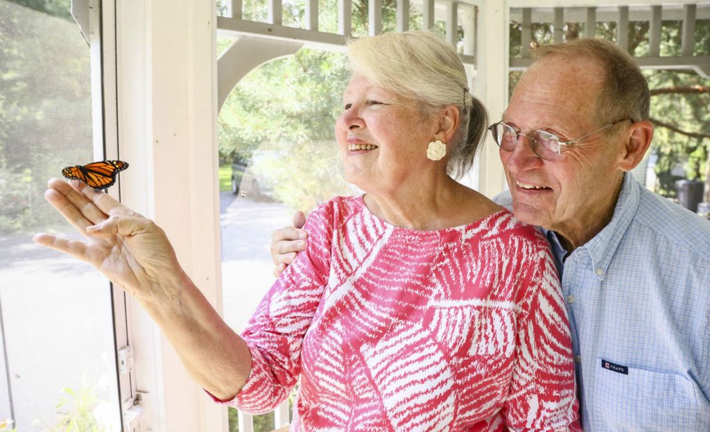 Portrait - 1st place - Grant and Susan Garn operate a monarch butterfly waystation in their backyard  in Perrysburg.  (Jeremy Wadsworth / The Blade)