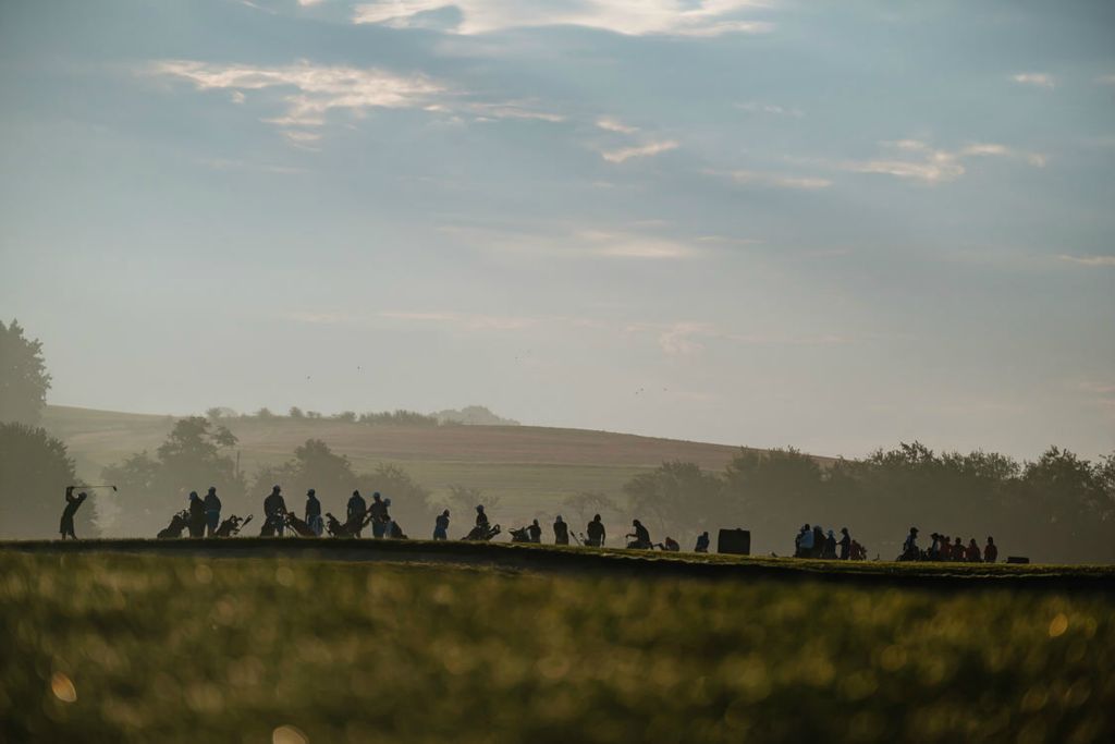 Sports Feature - 1st place - Golfers warm up during the Garaway Pirate Invitational Golf Tournament, Friday, Aug. 5 at Black Gold Golf Course in Sugarcreek.  (Andrew Dolph / The Times Reporter)