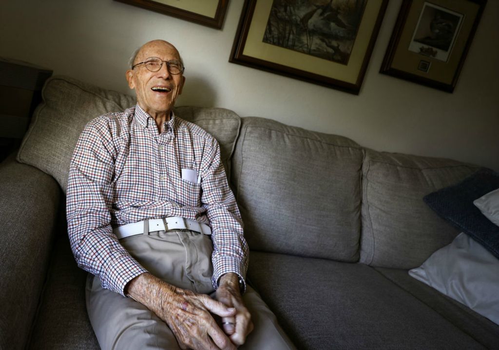 Portrait - 3rd place - Harold Hoffman, 97, a 1943 Central Catholic High School graduate and World War II veteran will be honored during halftime of the Fighting Irish football game. Here Mr. Hoffman is in his home in Toledo.  (Jeremy Wadsworth / The Blade)