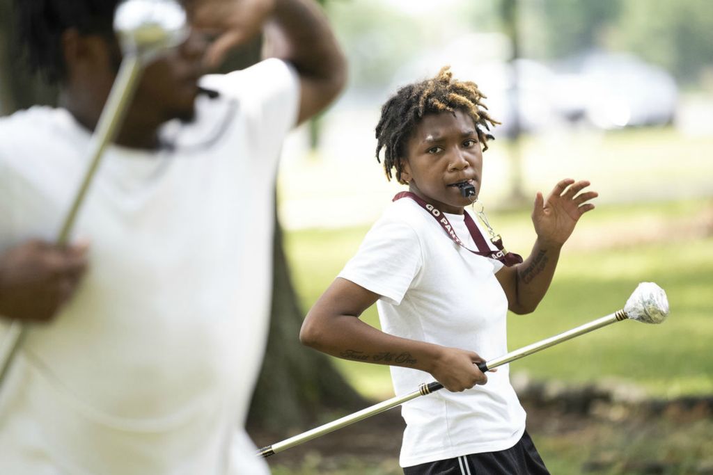 Story - 1st place - Drum Major Tarlyn Arnold looks to fellow major Kenji Harris during practice outside of the Linden-McKinley STEM Academy. The band is trying to raise funds to go to Memphis for an HBCU marching band performance in Memphis.  (Brooke LaValley / The Columbus Dispatch)