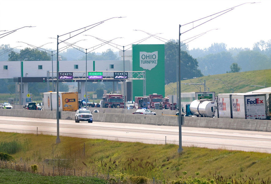 Spot News - 1st place - Emergency personnel on the scene of one of several crashes on the Ohio Turnpike in Swanton Township. Four people were killed in a series of crashes.  (Kurt Steiss / The Blade)   (Kurt Steiss / The Blade)