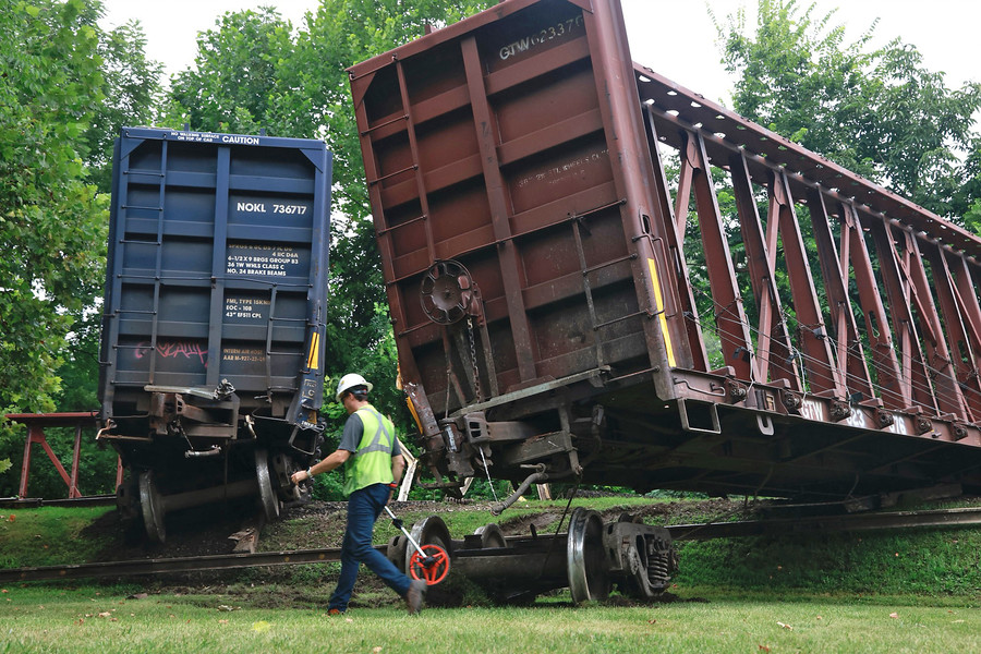 Spot News - 3rd place - At least 10 train cars were involved in a derailment in Springfield just west of Bechtle Avenue on the Indiana and Ohio railway. According to the Springfield Police Division, there were no injuries and no hazardous materials were spilled.  (Bill Lackey / Springfield News-Sun)   (Bill Lackey / Springfield News-Sun)