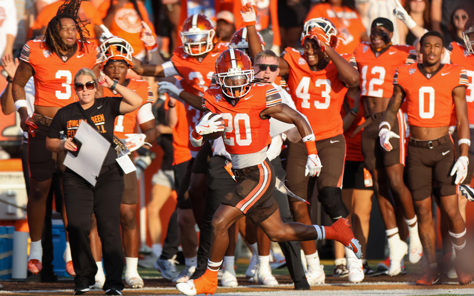 Sports Feature - HM - Bowling Green State University’s Justin Pegues scores on a 100-yard kick return to start the home opening game against Fordham University at Doyt L. Perry Stadium in Bowling Green.  (Jonathan Aguilar / The Blade)   (Jonathan Aguilar / The Blade)