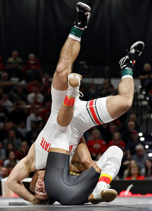 January - 2nd place sports - Ohio State's Luke Pletcher flips over Arizona State's Navonte Demison during a 141lb match at the Covelli Center at Ohio State University. Pletcher who is ranked 1st beat Demison TF, 19-4. (Kyle Robertson/The Columbus Dispatch)