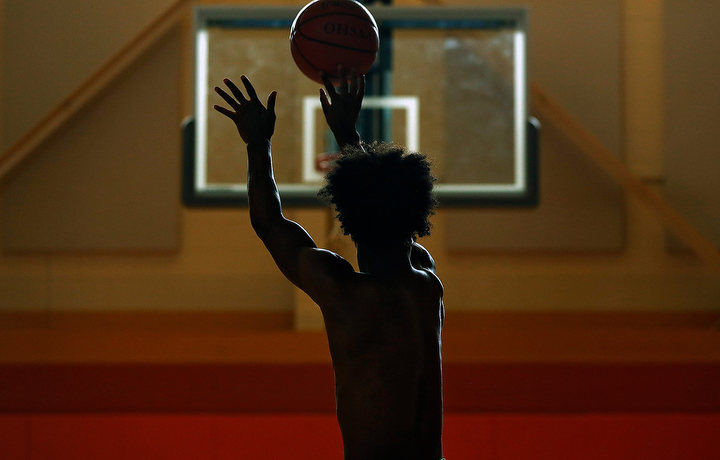 June - 3rd place sports feature - Columbus South's Trevell Adams practices his three point shot at Driving Park Community Center Center during the the summer on August 20, 2019.  (Kyle Robertson / The Columbus Dispatch)