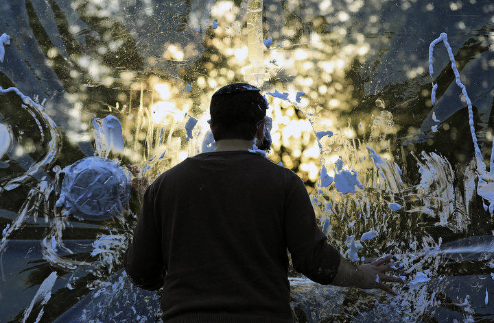 October - 2nd place feature - Rabbi Mendy Kaltmann waits to get a shaving cream cake into the face at the "Cake the Rabbi" booth during a drive-thru carnival for Jewish holiday of Sukkah at Lori Schottenstein Chabad Center in New Albany. Kyle Robertson / The Columbus Dispatch