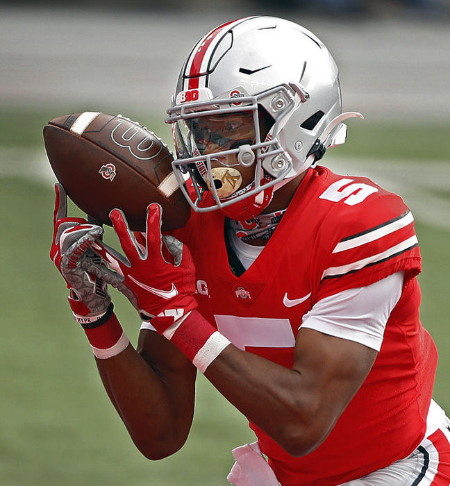 October - 1st place sports - Ohio State wide receiver Garrett Wilson (5) makes a touchdown catch in the end zone against Nebraska Cornhuskers during the 1st quarter at Ohio Stadium in Columbus.  Kyle Robertson / The Columbus Dispatch