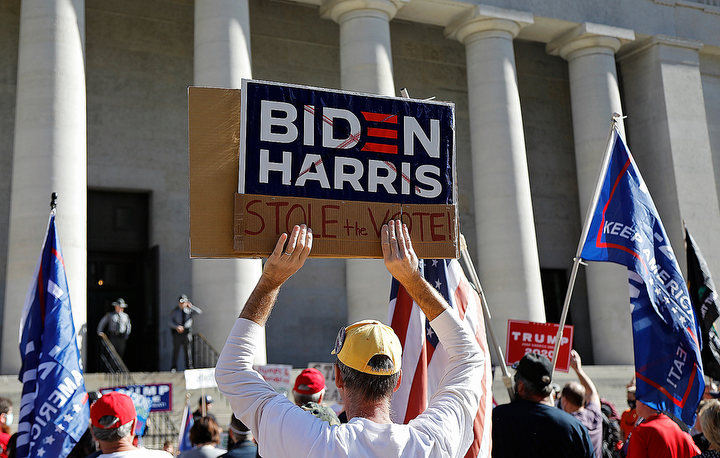 November - 1st place story - Trump supporters cheer "stop the steal" during a rally at the Ohio Statehouse in Columbus. Democrat Joe Biden was projected to become the president-elect of the United States on Saturday morning.  Kyle Robertson / The Columbus Dispatch