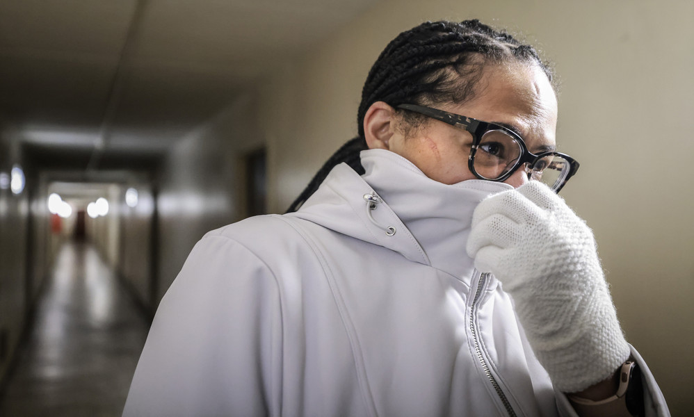 January - Story - 2nd place - Councilwoman Vanice Williams covers her nose to shield herself from the stench from trash piled up at Ashland Manor in Toledo.  (Jeremy Wadsworth / The Blade)