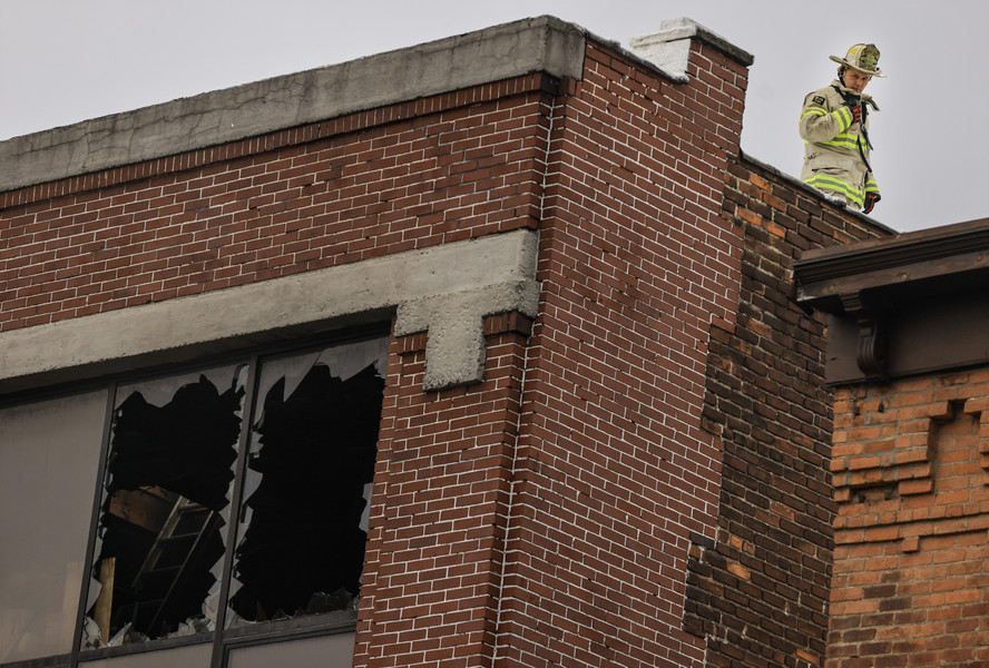 February -  Spot News - 3rd place - Firefighters work the scene of a fire at The Blarney, February 22, in Toledo.   (Jeremy Wadsworth / The Blade)}