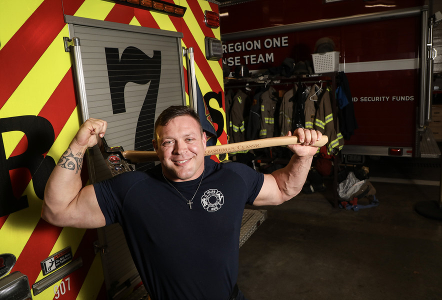 March - Portrait - 1st place - Toledo firefighter Marcus Waugh recently won the World's Strongest Firefighter competition. (Jeremy Wadsworth / The Blade)