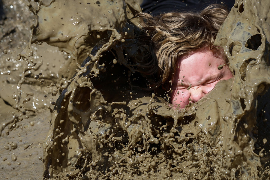 May - Feature - 1st place - Fourth grader Liam Farthing makes his way through  a Tough Mudder style obstacle course at Greenwood Elementary School in Toledo. The entire school competed in obstacle courses for a focus on physical fitness and fun.  (Jeremy Wadsworth / The Blade)  