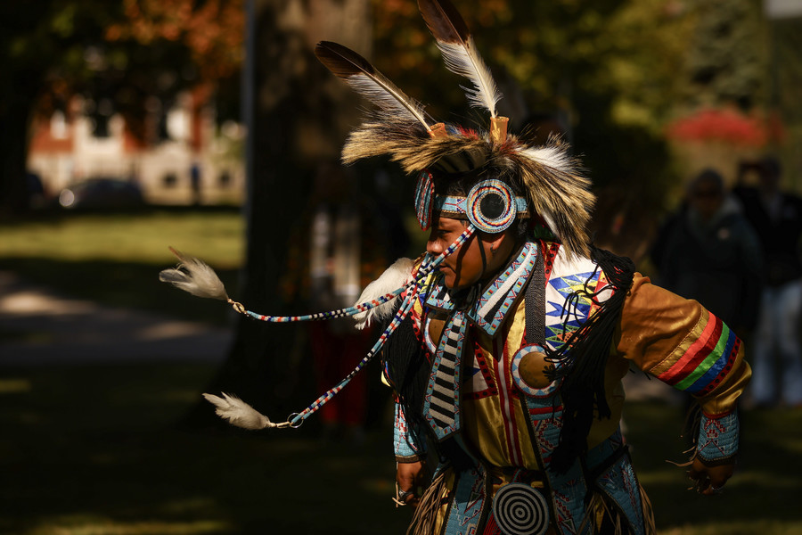 October - Feature - HM - James Eaglestar of Copper Face United, a Native American intertribal song and dance group, performs during an Indigenous People's Day event at the Toledo Museum of Art Glass Pavilion. (Jeremy Wadsworth / The Blade) 