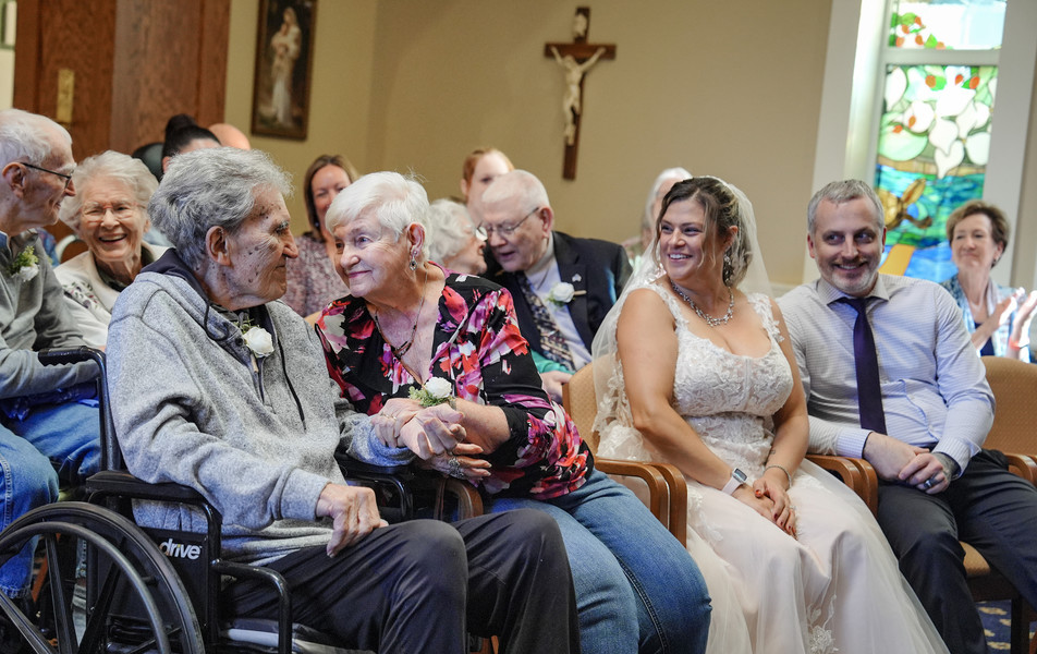 October - General News - 3rd place - After 34 years of marriage, Bob & Marylin Klear renew their wedding vows during a "We Still Do" vow renewal and reception to celebrate Sweetest Day at Ohio Living Swan Creek in Toledo. (Jeremy Wadsworth / The Blade) 