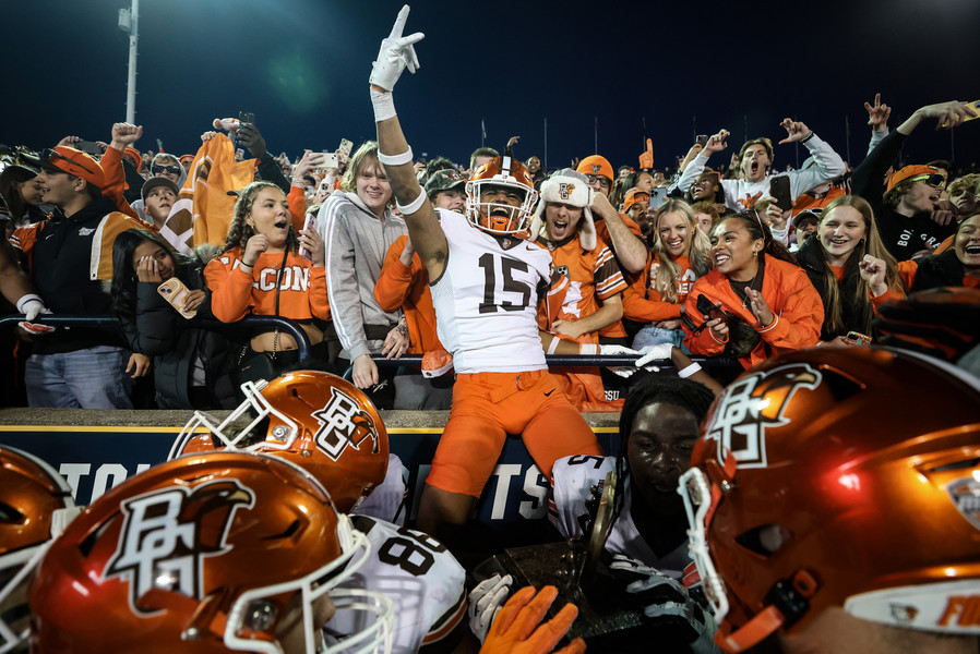 October - Sports Feature - 2nd place - Bowling Green State University line backer Avi McGary celebrates winning the Battle of I-75 against the University of Toledo at the Glass Bowl in Toledo. BGSU defeated UT, 41-26. (Jeremy Wadsworth / The Blade) 