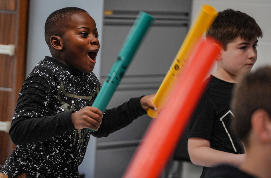 November - Feature - HM - Third grader Kalvin Jones enjoys using Boom Whackers during Angie Dalton’s music class at Birmingham Elementary in Toledo. Birmingham Elementary has received the district’s first Intro to Music Grant through the Save the Music Foundation. This includes $27,000 worth of new musical instruments and supplies. (Jeremy Wadsworth / The Blade)