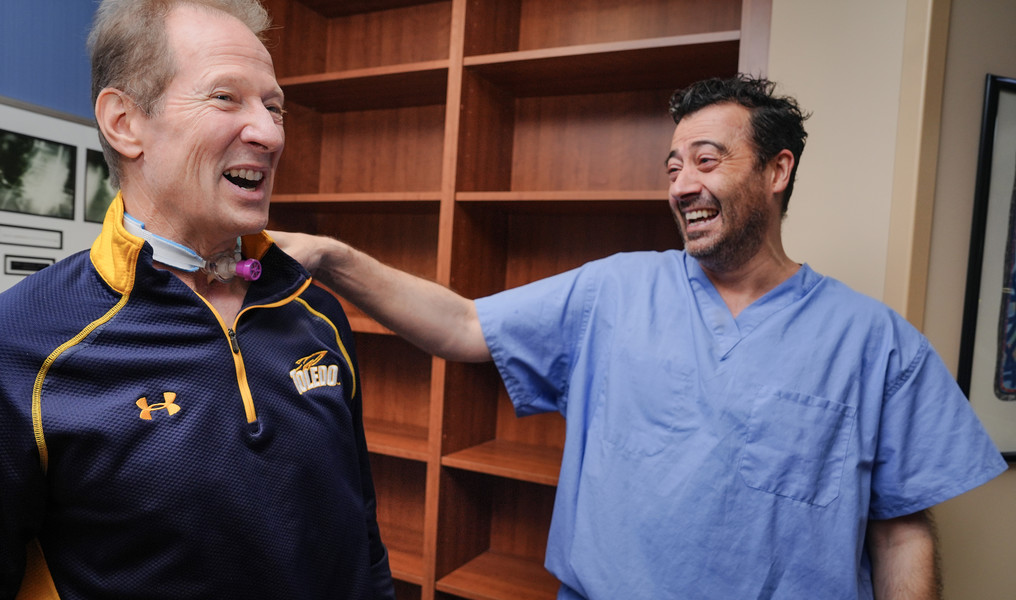 November - General News - 1st place - Jacques "Jack" Petree greets Dr. Daniel DiBardino at Mercy Health - St. Vincent Medical Center in Toledo. Dr. DiBardino helped saved Mr. Petree’s life after a weight lifting accident. (Jeremy Wadsworth / The Blade)