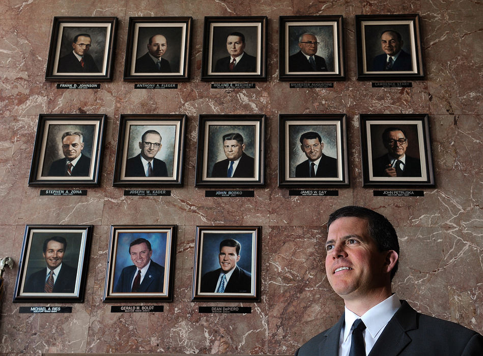 Portrait - 3rd place - Mayor Dean DePiero of Parma pictured at City Hall with all the past mayors of the city. DePierowill pass the torch on when he leaves the office in January.   (Kyle Lanzer / Sun Newspapers)