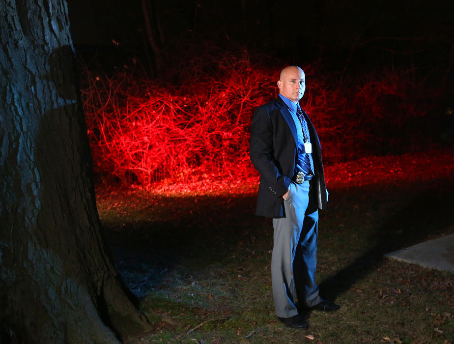 Portrait - 2nd placeDet. Steve Eppert, of the Columbus Police Department, stands in an open area north of the townhouse where Alicia Jackson was stabbed to death. This is near where the police dogs lost the scent of a possible suspect two years ago in a murder that is yet to be solved.  (Jonathan Quilter / The Columbus Dispatch)